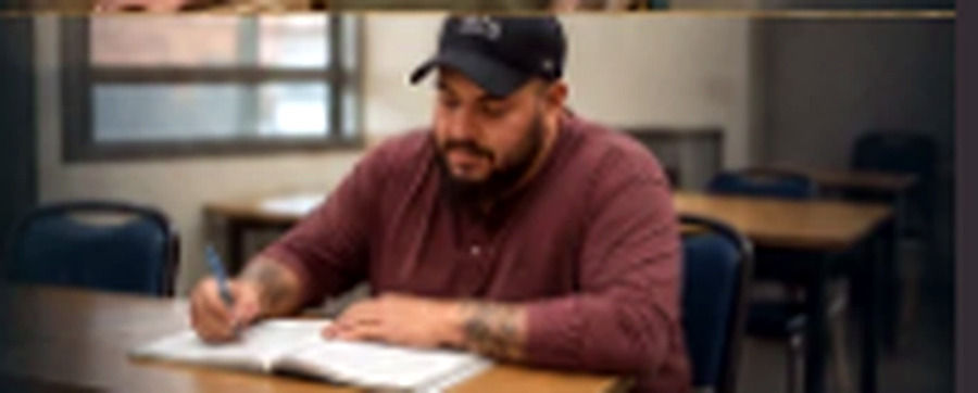 Jose studying in an English class